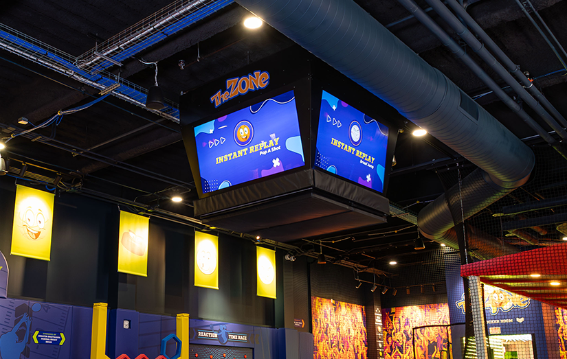 View of the Jumbotron and surrounding activities at theZone