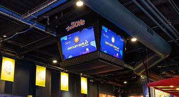 View of the Jumbotron and surrounding activities at theZone