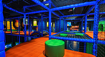 Interior View of the Prime Time Climb activity at the Zone