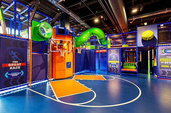 Interior view of the basketball courts, tunnel experience and great race activities at the Zone